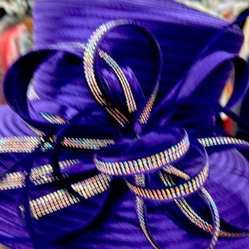 Beautiful Hat to dress up with any occasion. 100% polyester n made in China